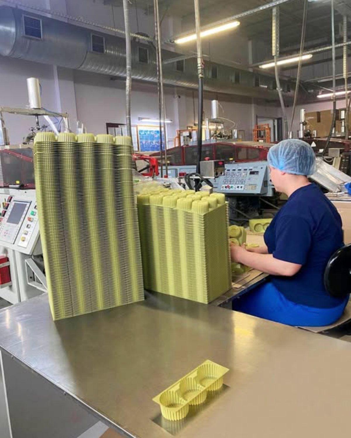 Packing area: finished trays being stacked
